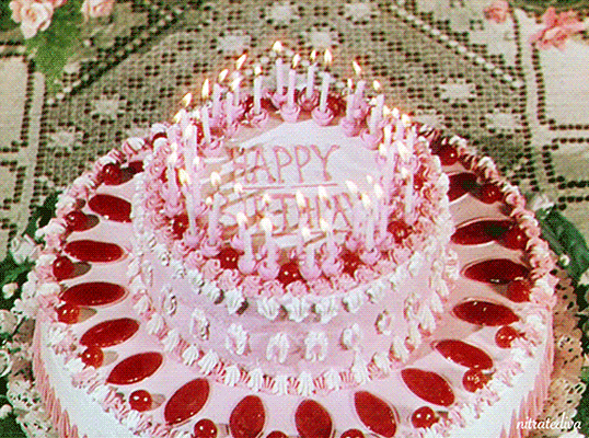 large-happy-birthday-pink-cake-with-burning-candles-animated-gif-2